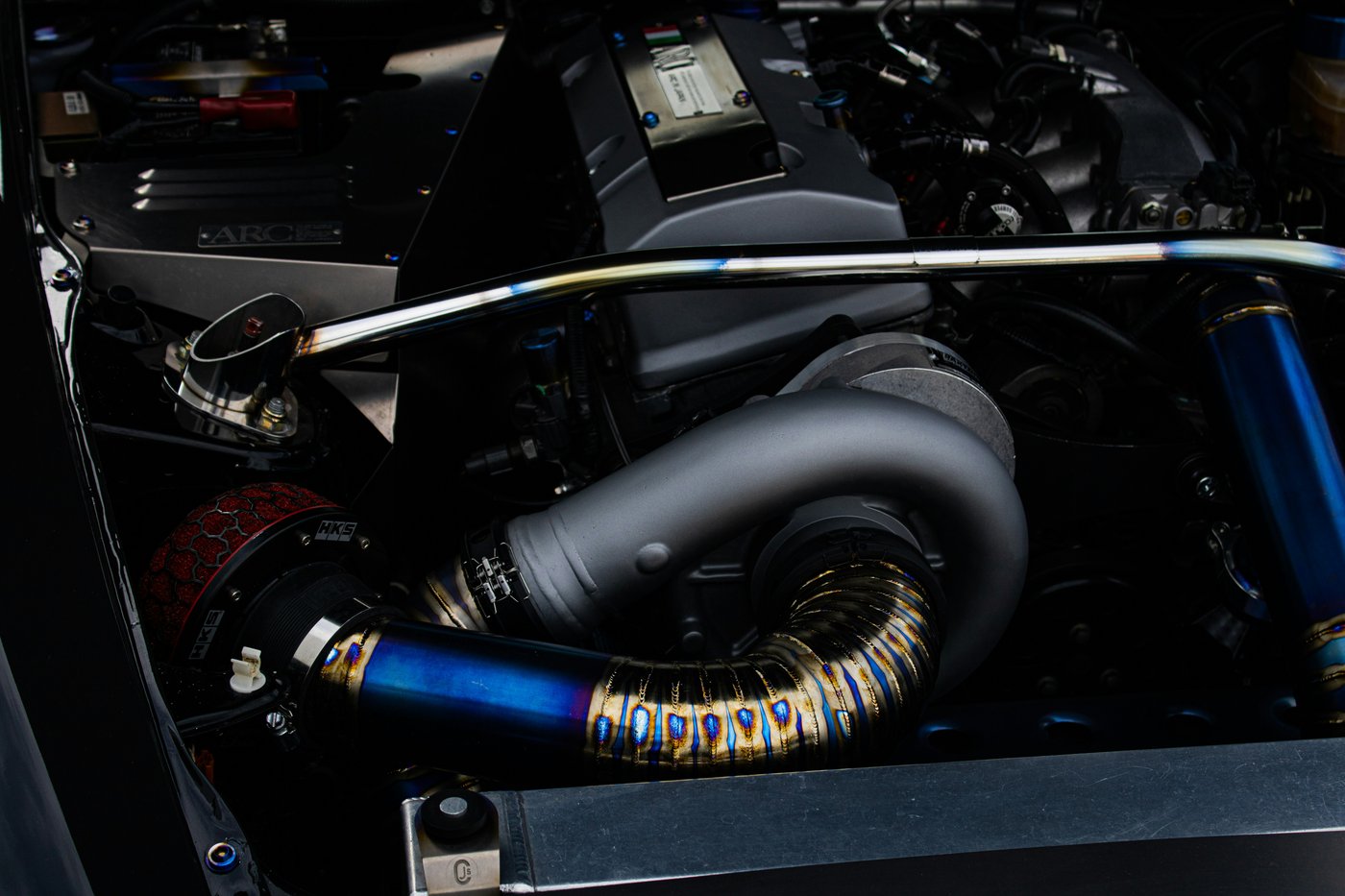 Fabricated turbo piping in an engine bay