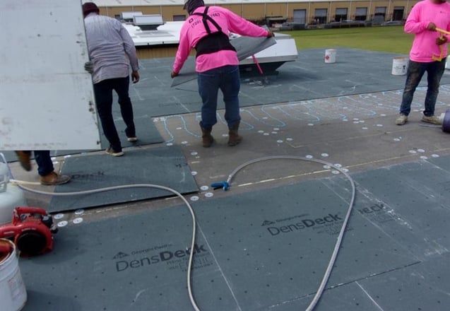 Trinity Construction Services completing a commercial roof replacement in Colorado