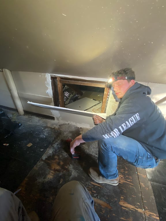 Technician testing a residential HVAC system