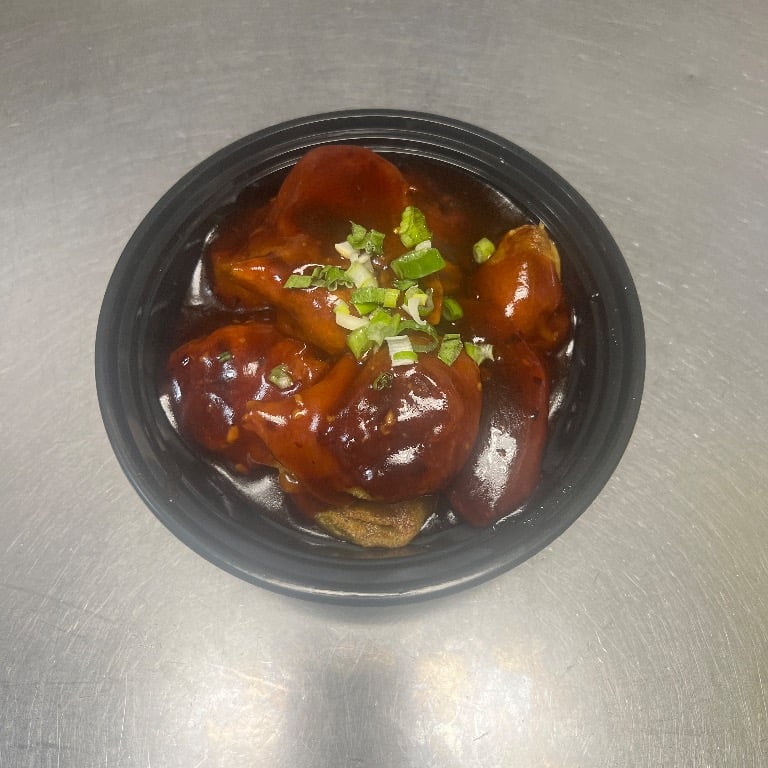 12d. Pan Fried Wonton in Spicy Garlic Sauce (12)