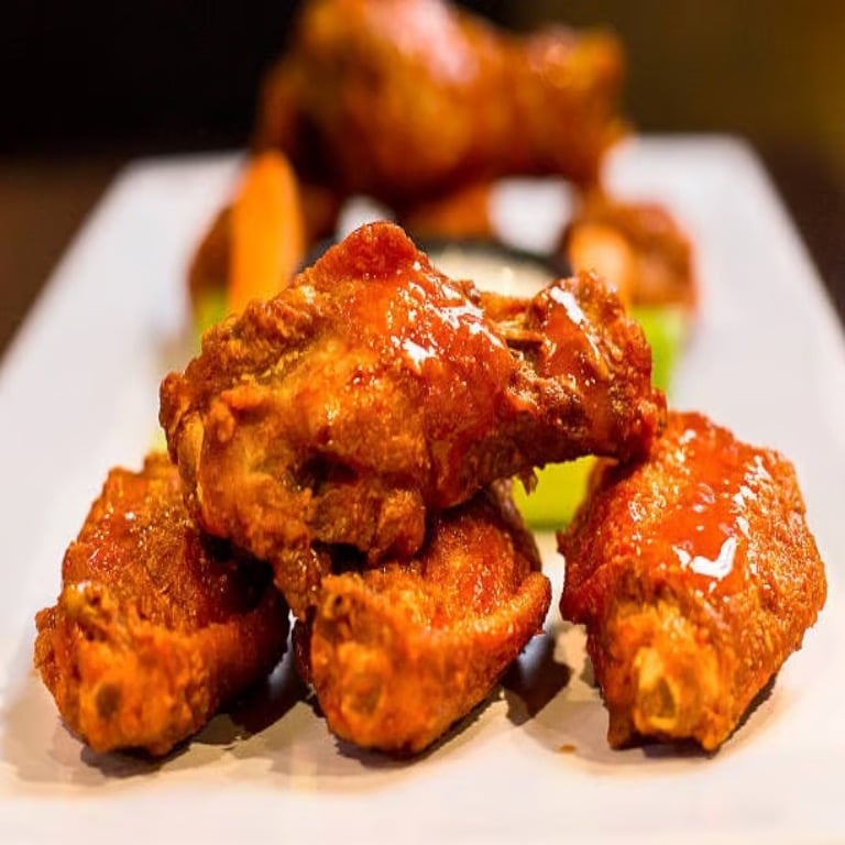 D 6. Buffalo Chicken Wings (4)