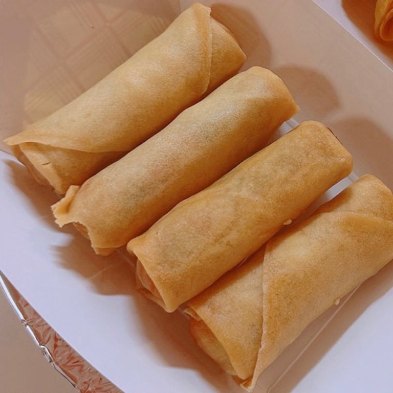 A1. Egg Rolls (4 Pc)