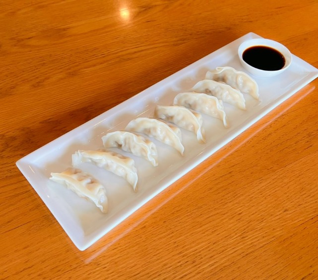 A6. Steamed Dumplings (8)