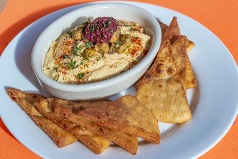 Hummus with pita chips Image