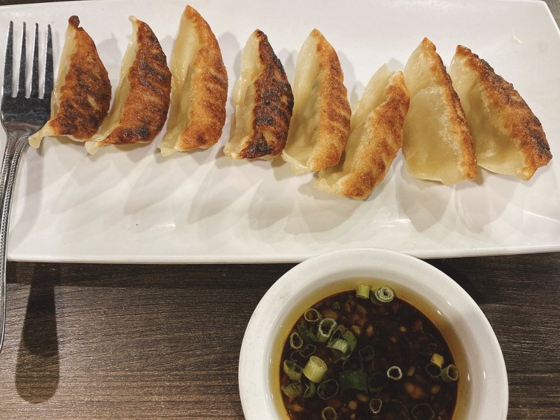 8. Pot Stickers (8) w. Chili Sauce