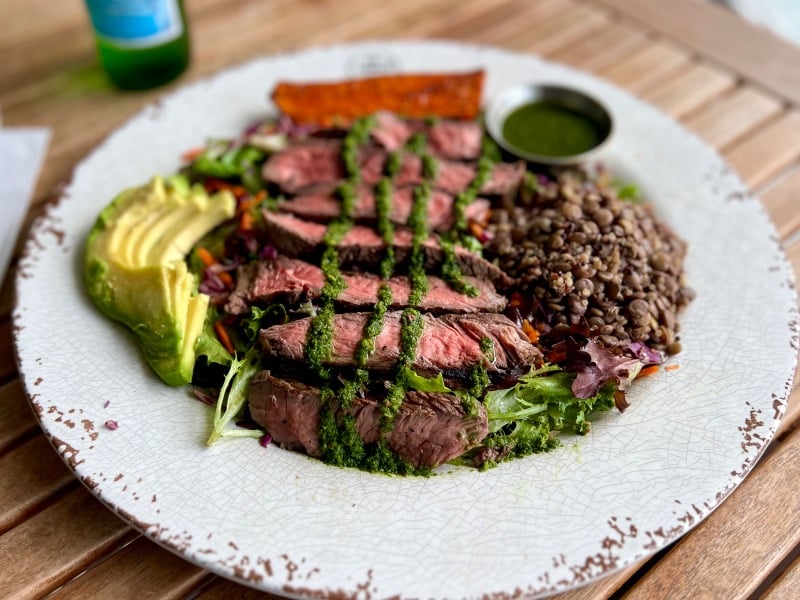 Steak with chimichurri and mixed greens salad