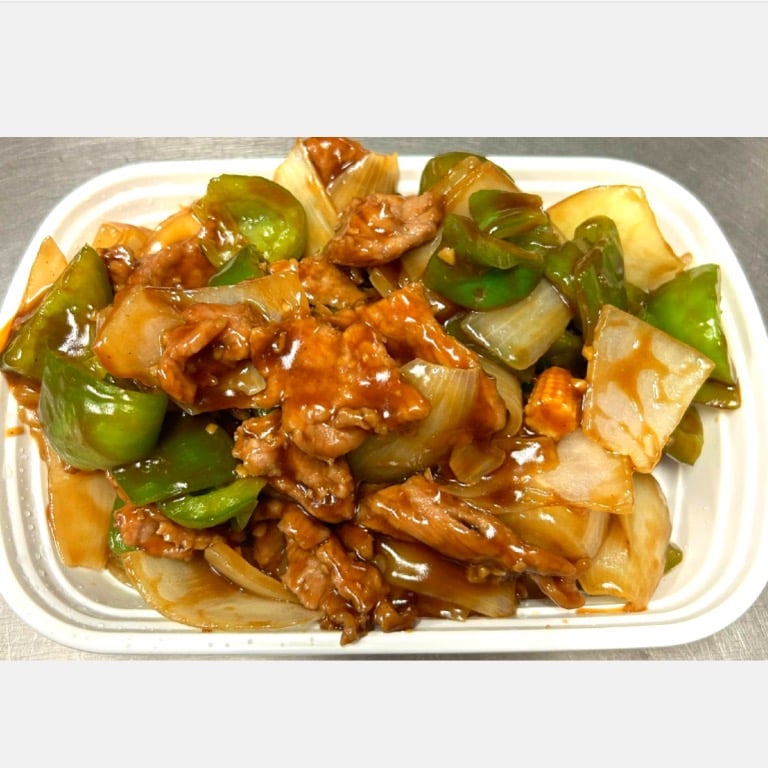 60. Pepper Steak w. Onions