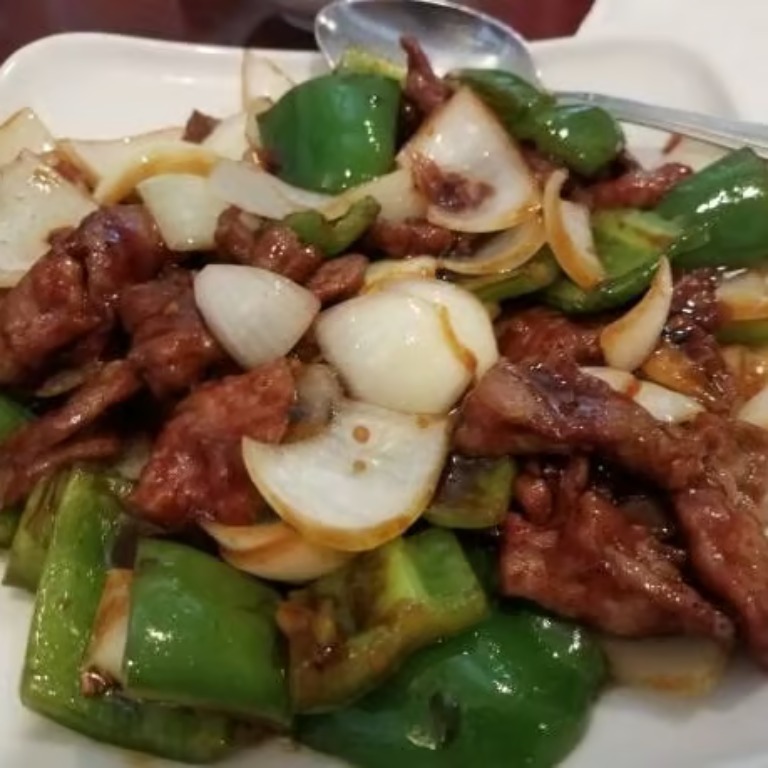 60. Pepper Steak w. Onions