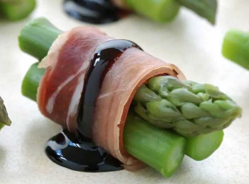 Asparagus wrapped in Italian prosciutto