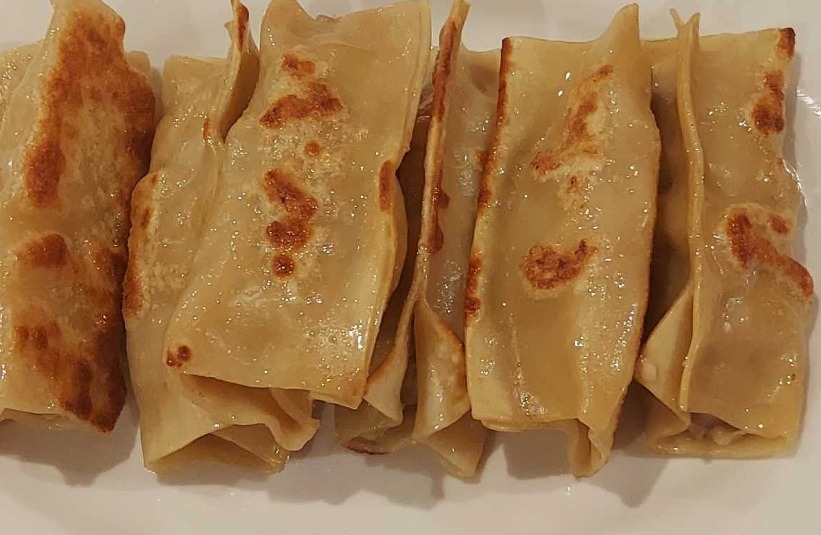 锅贴 11. Pot Stickers