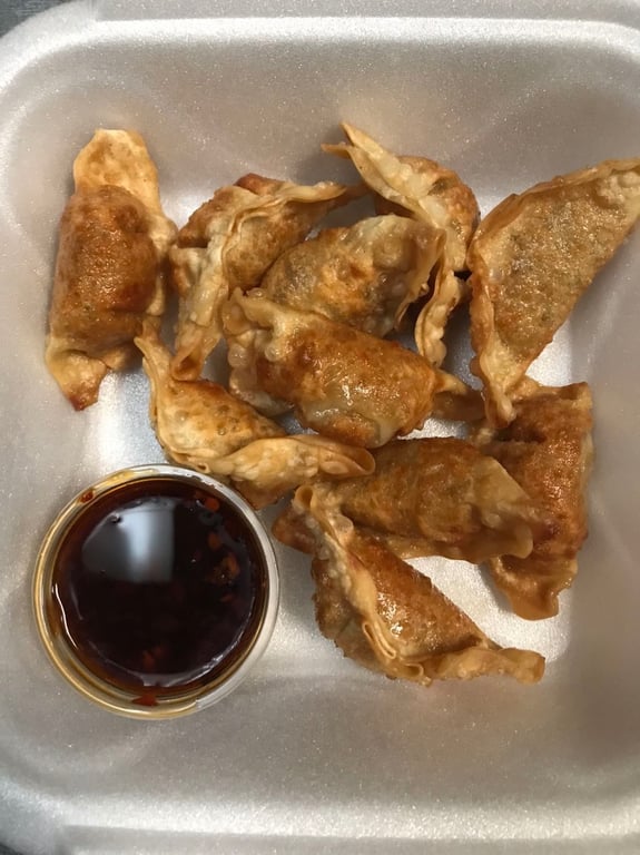 A6. Fried Dumplings (10) 锅贴