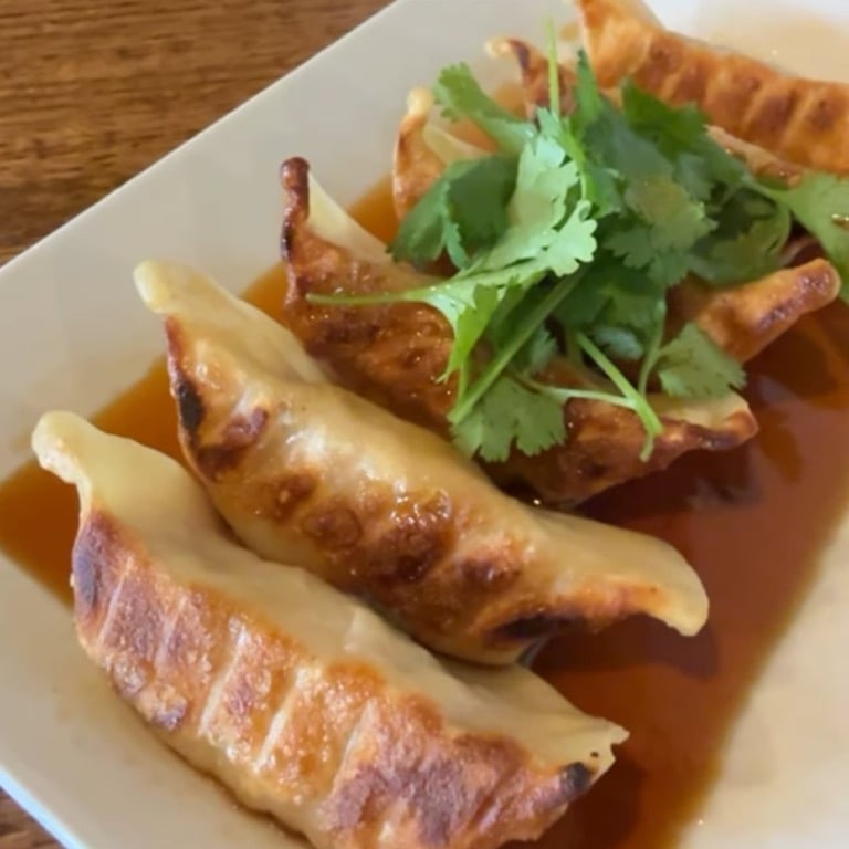 A4. Pork Dumplings (6)