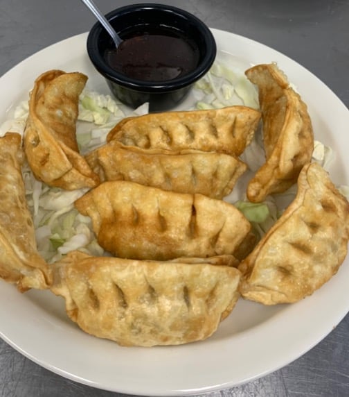 A8. Fried Dumplings (8 pcs)