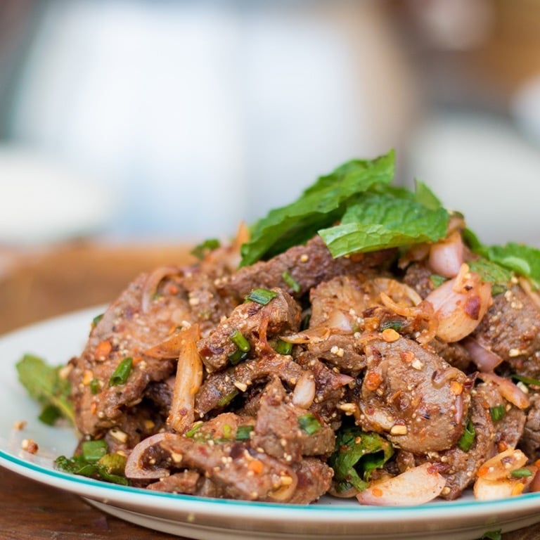 7. Nam Tok Muu (Spicy Grilled Pork)