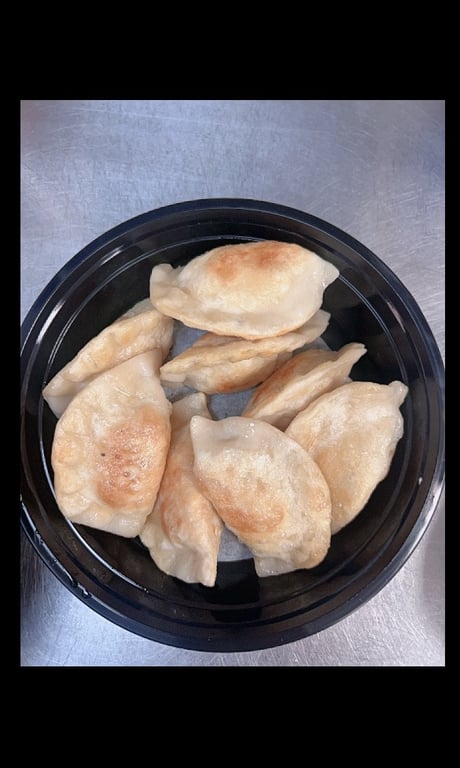 Pan Fried Pork Dumplings  锅贴