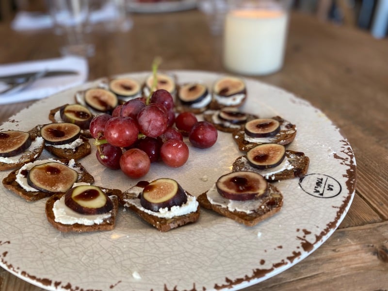 Artisan crackers with goat cheese and figs