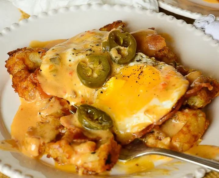 4 Eggs any Style+Tater Tots & Bun