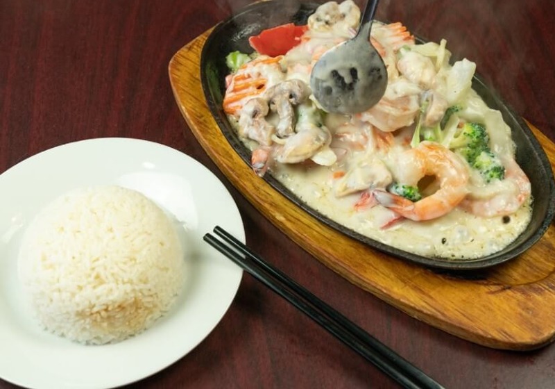 82. Sizzling Lemongrass Coconut Prawns