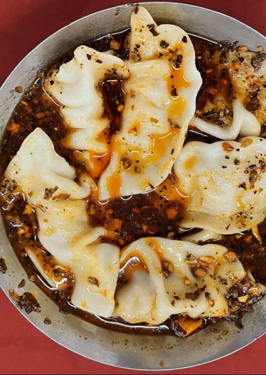 D5. 水饺 Dumpling in Spicy Sauce