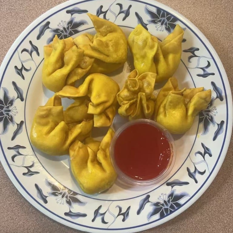 105. Crab Rangoons (8)