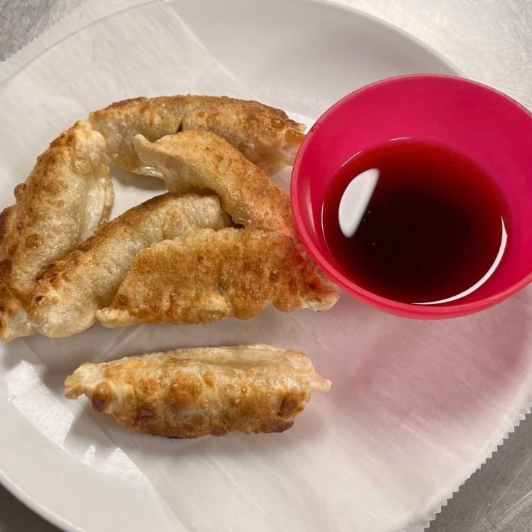 A10.  Pot Stickers (6)