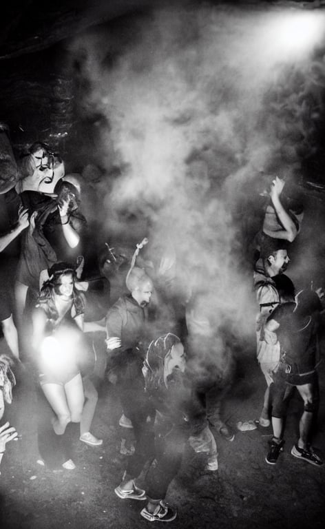 prompthunt: a argentic photography dark party with smoke and laser system  in paris catacombs, les catacombes, people dancing, dark, uv, techno, bones,  party, photography canon, ecstasy, illegal, alcohol,