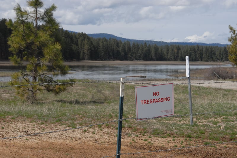 No Trespassing Sign and Bridge Right-of-Way Marker