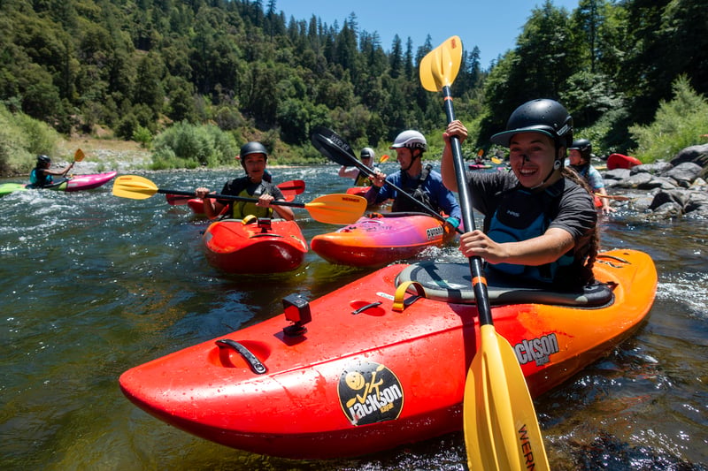 In the eddy at the surf wave above Rock Creek