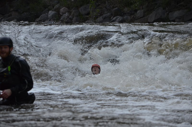 One of these people isn’t in their boat, but the other is!