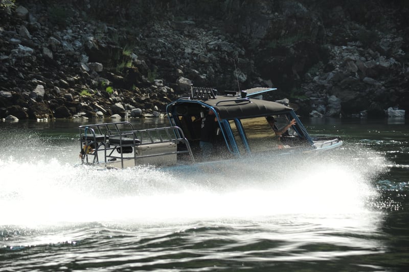Jet Boat Passing Johnson Creek Camp