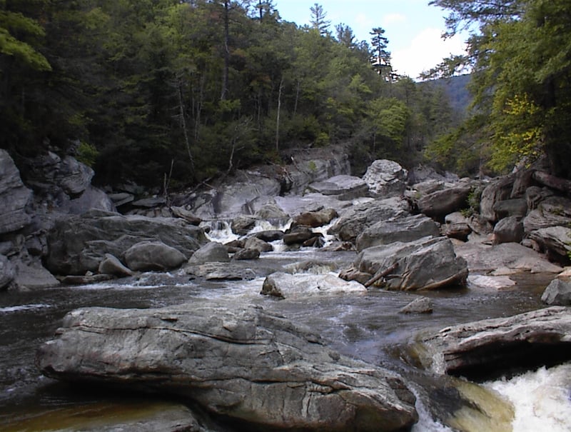 Looking up at the clapper rapid below Cave Falls