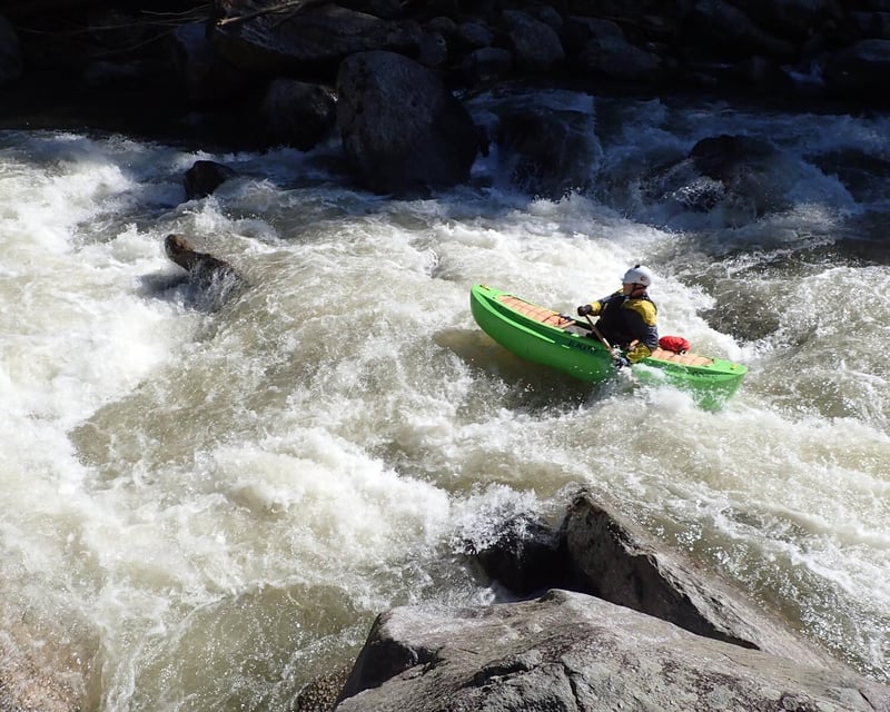 Dennis Huntley in Blackfly open canoe
