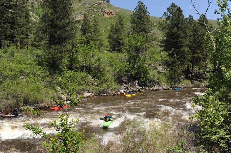 Pete Surfing the Wave at the Top of Greyrock Bridge Rapid