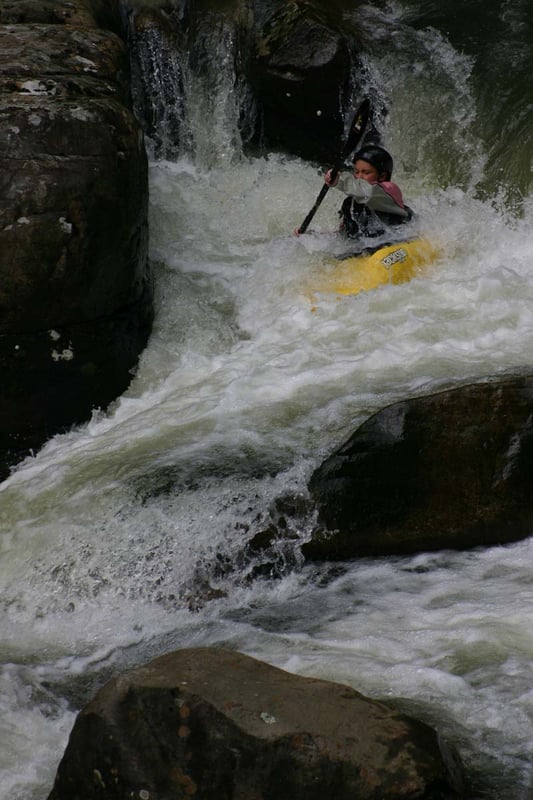 Lauren Burress having fun creeking