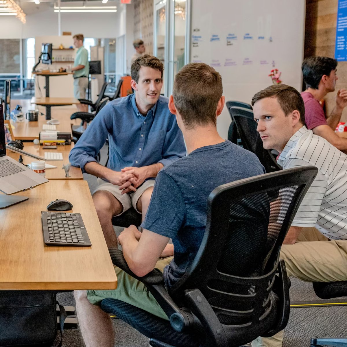 The boys sitting in the office