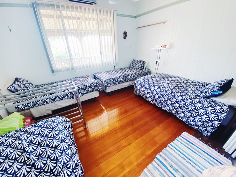 Bedroom with multiple beds