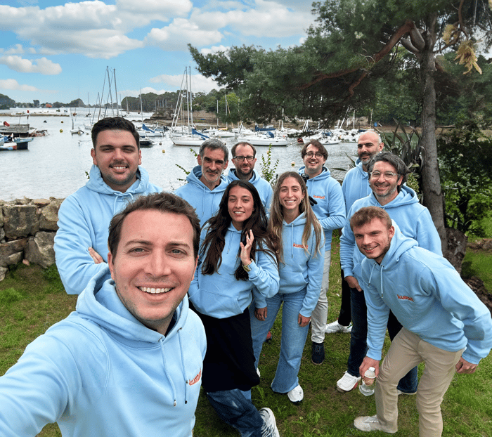 Photo of the Kurrant Team in a Park next to a Marina