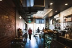 Chic Cafe in the Heart of North Melbourne - Taking $8,500 p/w. (Our Ref: V2068)