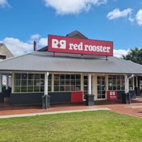 Premium Red Rooster In Gladstone Park image