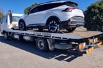 Tow Truck with  13 TILT plates.