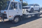 Tow Truck with  13 TILT plates.