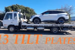 Tow Truck with  13 TILT plates.