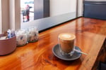 HIGHLY PROFITABLE LICENSED CAFE IN THRIVING TOWN - LIMITED COMPETITION