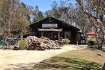 ICONIC LOG CABIN TEA HOUSE RESTAURANT WITH TOP VIEWS UNDER MT GLADSTONE LOOKOUT
