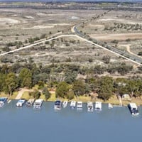Scenic Houseboat Property for Sale - River Murray Location -Freehold Land - Net Profit: $60-$120K - Substantial Industrial Shedding - Massive Growth P image