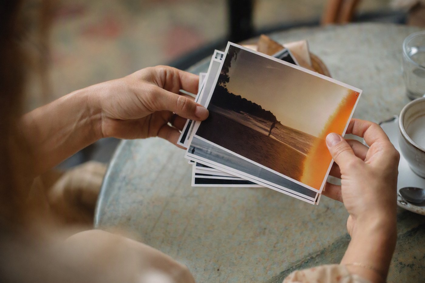 What all of this is imitating: a stack of real prints with a light leak on top