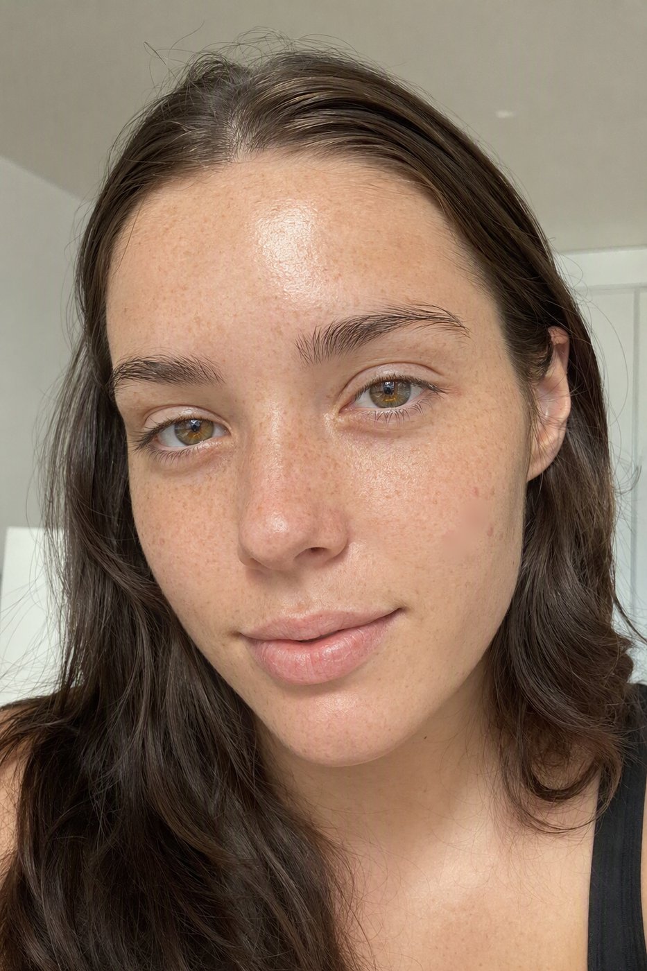 After: A natural retouch: shine evened, two blemishes gone, freckles and pores exactly where they were