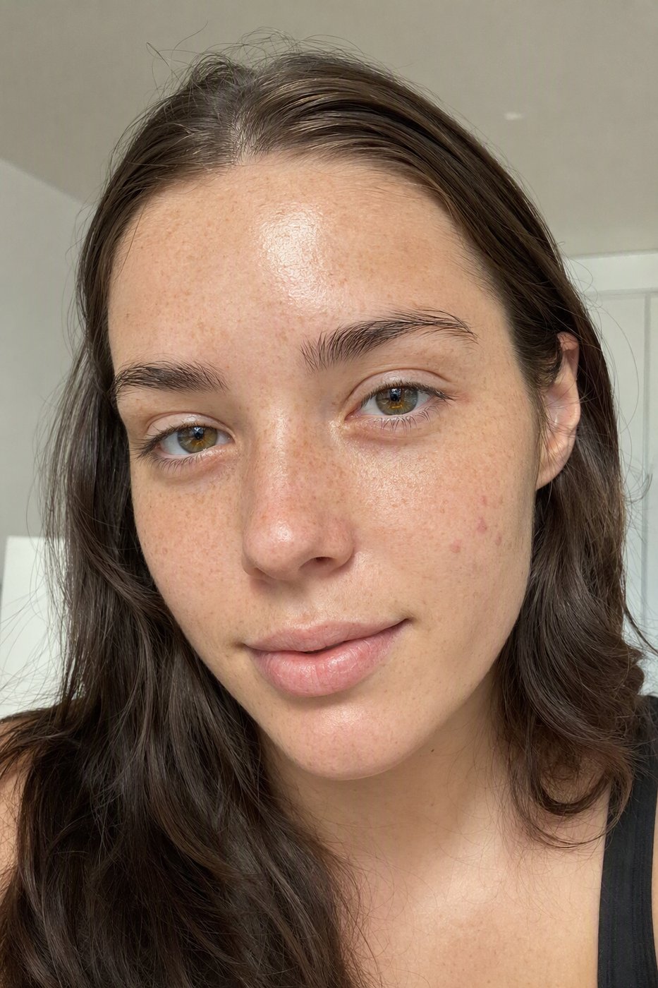 Before: A natural retouch: shine evened, two blemishes gone, freckles and pores exactly where they were