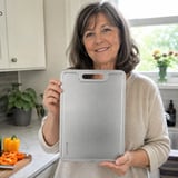 Linda holding a Kasuri cutting board