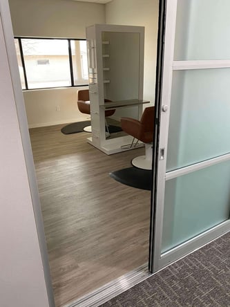 Fully furnished hair salon suite located at The Suite Emporium in Holstein, IA